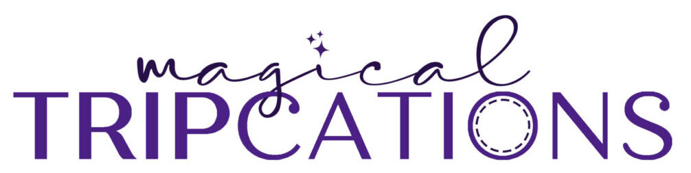 A purple and white logo for magical cats.